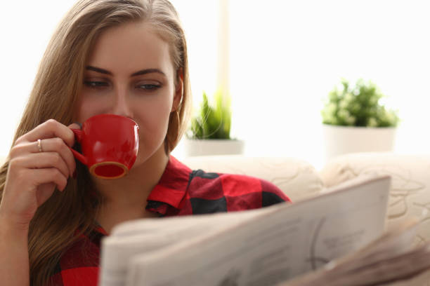 istock Portrait of tender blonde that drinking coffee 1309534925