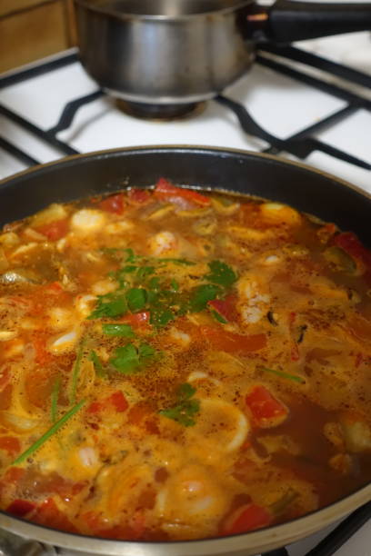 istock Seafood and fish broth  Spicy preparation for cooking rice 1309535595
