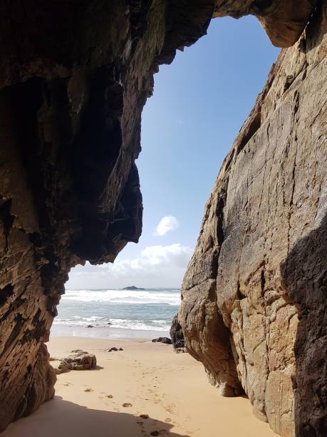 istock Between the rocks of the wild coast 1309541371