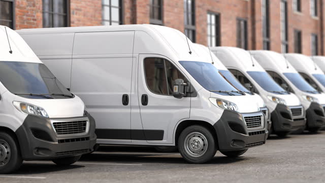 Delivery vans in a row; Express delivery; shipping service concept.