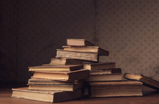 istock Old hardcover books on the table 1309542294