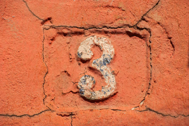 istock Old retro cast iron plate number 3 1309542944