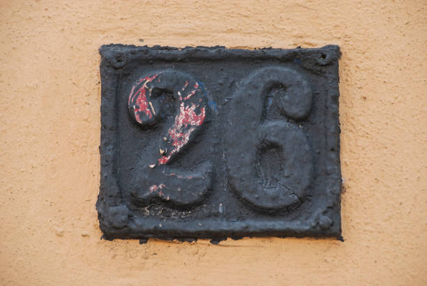 istock Old retro cast iron plate number 26 1309542957