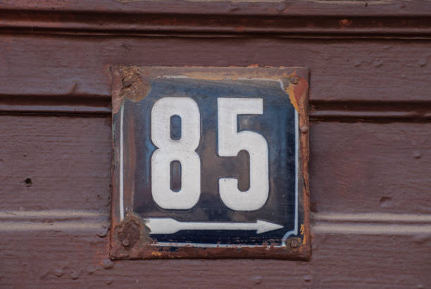 istock Weathered enamelled plate number 85 1309542966