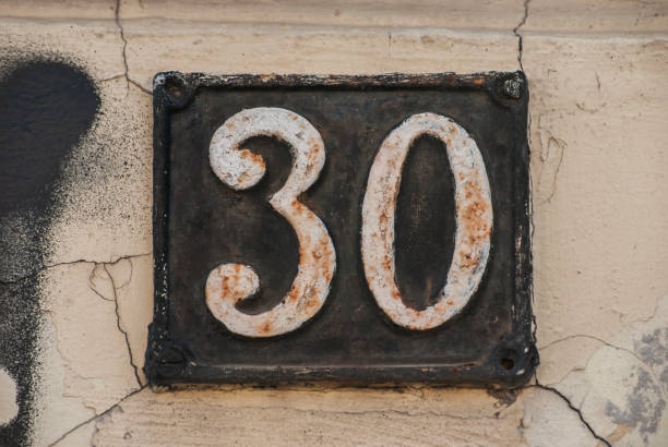 istock Old retro cast iron plate number 30 1309542977