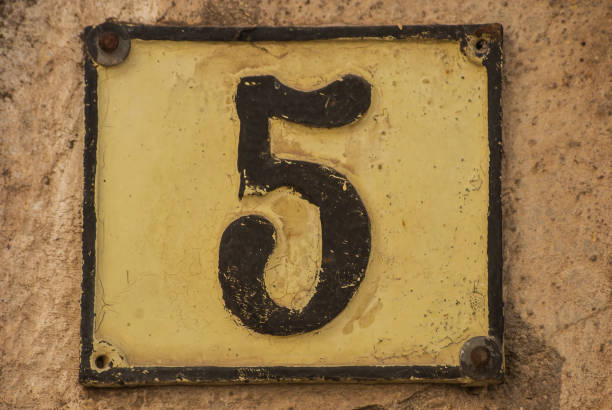 istock Old retro cast iron plate number 5 1309542992