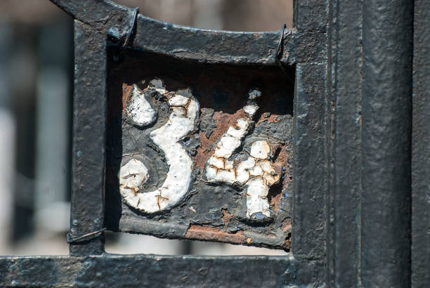 istock Old retro cast iron plate number 34 1309543013