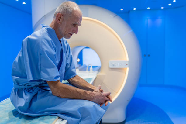 Worried Patient Waiting For MRI Scan Worried senion patient waiting for mri scan. pet scan photos stock pictures, royalty-free photos & images