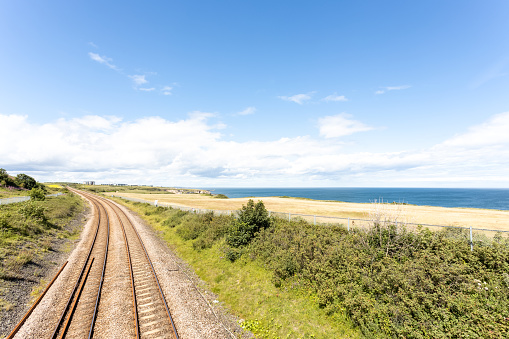 County Durham UK: 26th July 2020: Durham Heritage Coast East Coast mainline train tracks by the sea