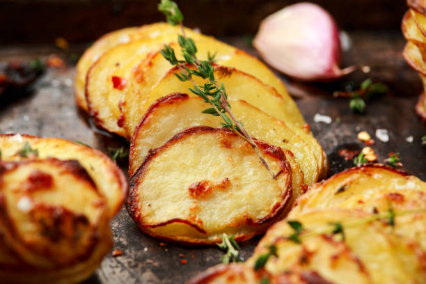 istock Hot Baked crispy potato stack with parmesan cheese and herbs 1309547431