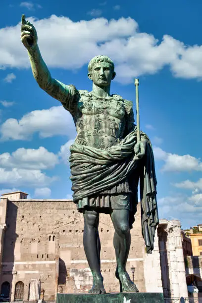 Italy, Rome. Statue in a public street of the roman emperor Gaius Julius Caesar. Concept for authority, domination, leadership and guidance.