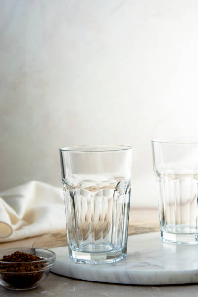 istock Empty glass for iced dalgona coffee, step by step recipe. Summer whipped coffee cold drink with vegan milk 1309550667