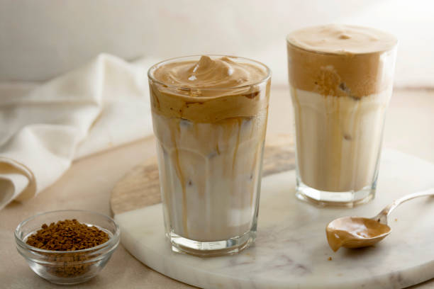 istock Iced dalgona coffee glasses, frothy creamy whipped coffee cold drink 1309550679