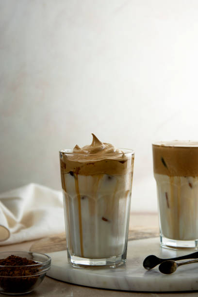 istock Iced dalgona coffee glasses, frothy creamy whipped coffee cold drink 1309550691