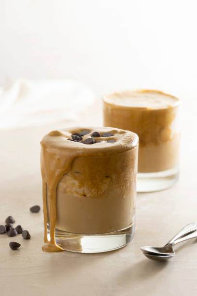 istock Affogato with Ice Cream, coffee glass with whipped cream and syrop, bright background 1309550737
