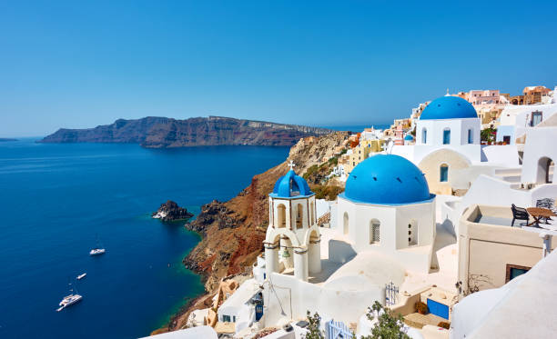 Greece, Santorini Island.  Panoranic view of Oia town on the high coast by the sea. Greek landscape