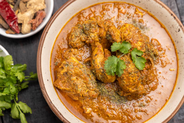 istock spicy gravy chicken served in a bowl with chapati 1309555426