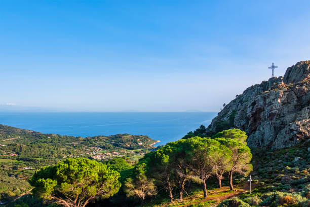 Monte Mar di Capanna (or Monte della Croce), a mountain that with its high iron cross dominates the coast and the town of Porto Azzurro