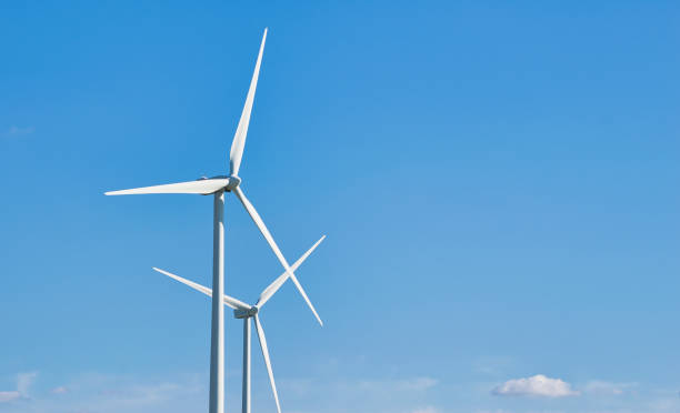 istock A couple of windmills producing green wind power 1309558016