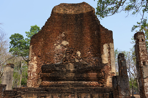 Ancient Buddha statue that have decayed over time at The Vihara of Wat Si Iriyabot, Kamphaeng Phet Historical Park, Thailand.