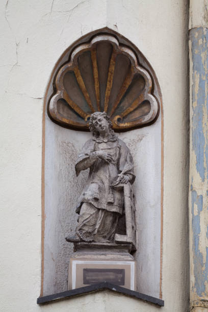 istock Baroque sculpture of woman with scipt feather below shell 1309558948