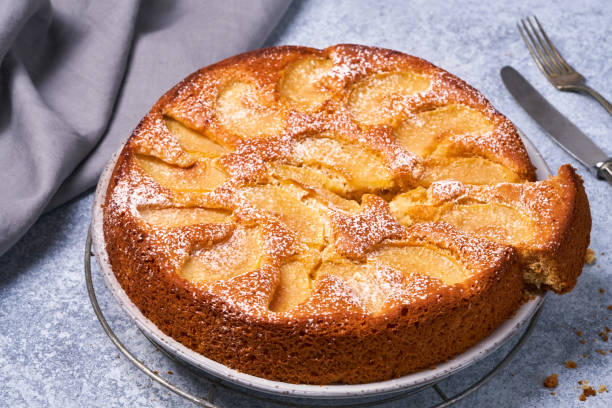 istock Composition with delicious apple tart on light background. 1309560341