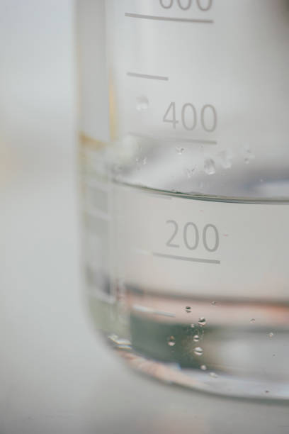 istock Clear Liquid inside of a Beaker - a Close Up 1309560505