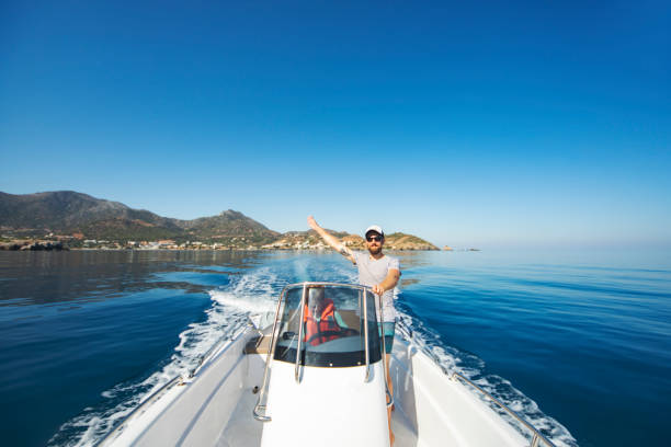 istock Father and son yachting 1309560590