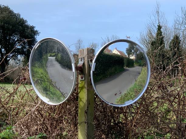 istock Traffic mirrors on country road 1309560738