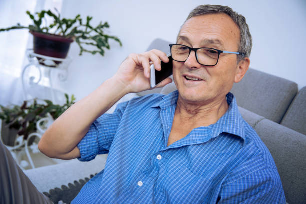 istock Senior Man Talking on the Cell Phone 1309565553