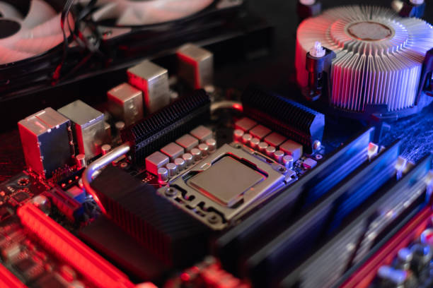 istock computer parts with CPU, graphics card, liquid cooling and motherboard 1309566415