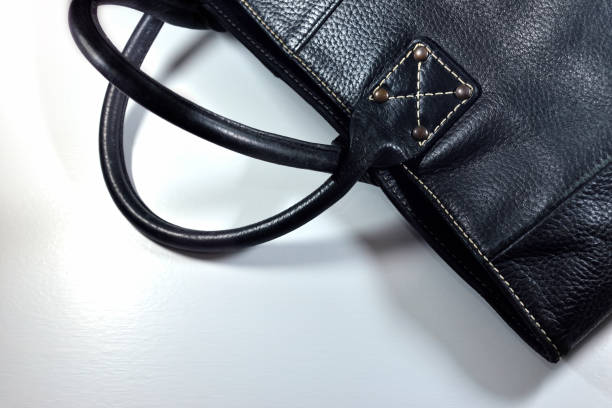 istock Black female bag isolated on white background, selective focus. 1309572382