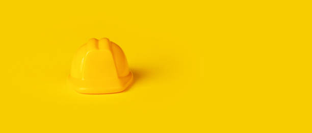 istock children's yellow helmet 1309573363