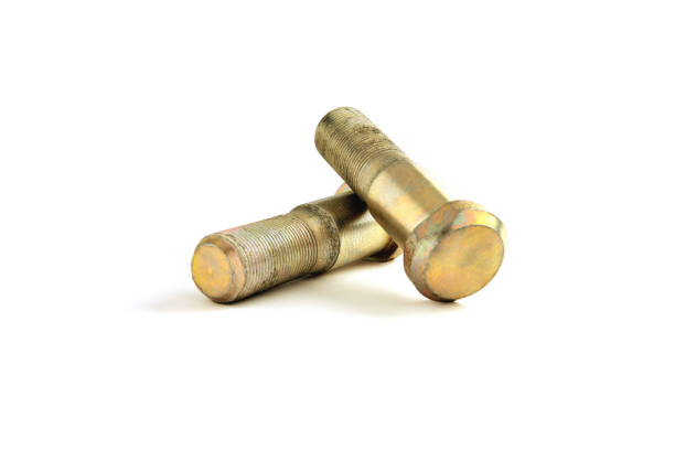 istock yellow galvanized bolts on a white background close-up 1309578531