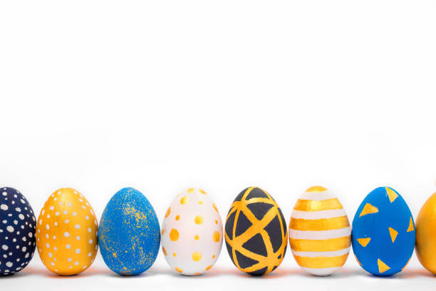 istock Easter golden decorated eggs isolated on white background 1309578877