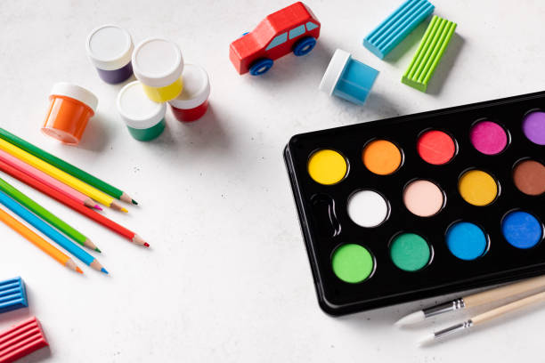 istock Colorful paints set on white background 1309581225