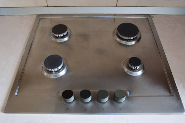 istock Kitchen gas stove with four non-burning burners 1309586781