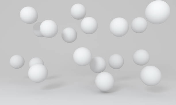 istock White floating spheres on photography studio background. 1309586952