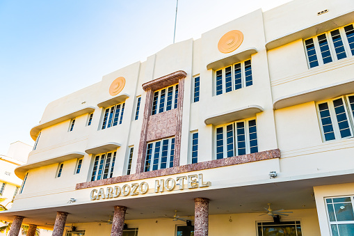 Miami Beach, USA - May 5, 2018: Low angle looking up view on Art Deco district Cardozo hotel building on South Beach Ocean drive street in Florida in summer