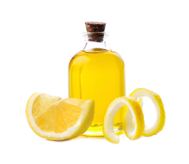 istock Lemon essential oil with lemon slice 1309589358