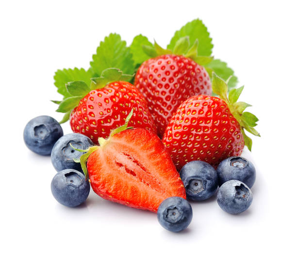istock Strawberry and blueberries with leaves 1309589388
