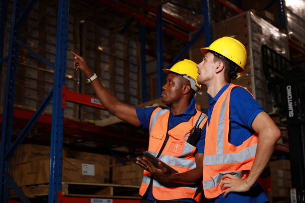 istock Warehouse logistic team working together in warehouse store, stock checking and audit process 1309592714