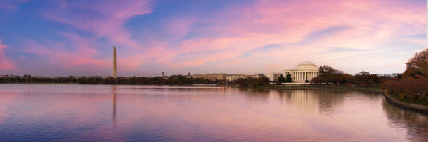 istock Jefferson Memorial and Washington Monument reflected on Tidal Basin in the morning. 1309594818