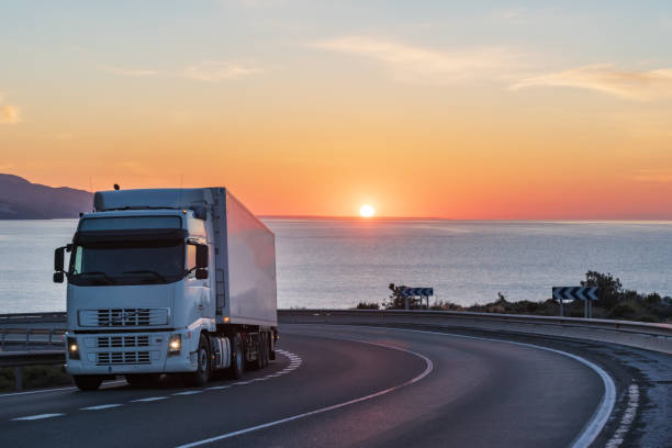 istock Truck with refrigerated semi-trailer on a mountain road 1309597331