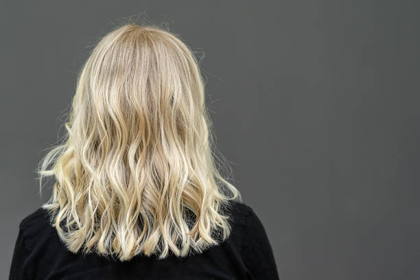 Beautiful long wavy hair. Back view