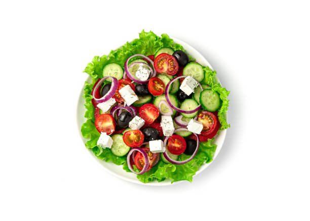 istock A plate of Greek salad on a white background 1309600799