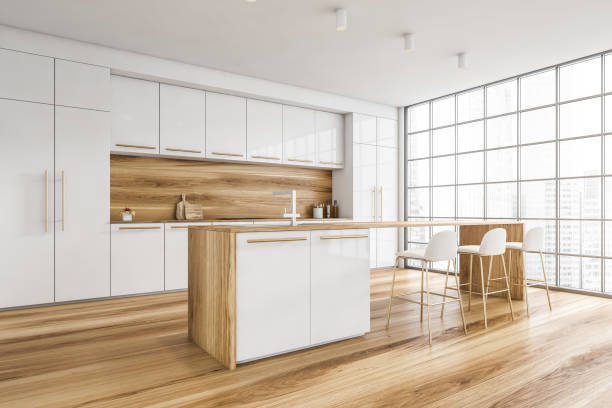 istock White and wooden dining room, kitchen near window with chairs and table 1309602317