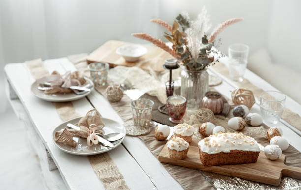 istock Easter table setting with freshly baked pastries and decor details. 1309602961