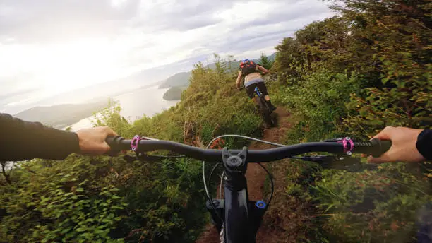 POV point of view mountainbike ride with friends: MTB up mountain of Norway