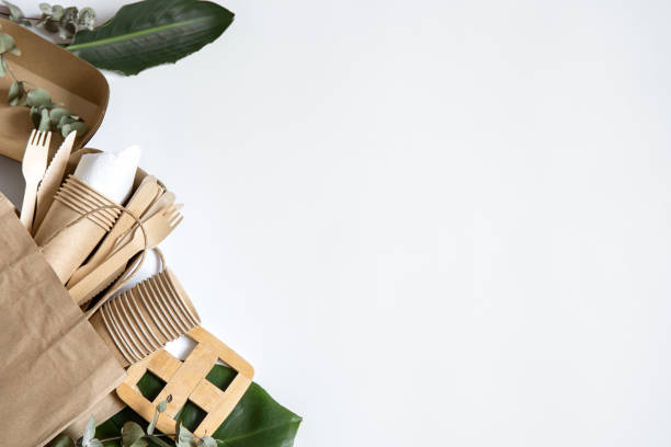 istock Disposable paper tableware with natural leaves copy space. 1309603432
